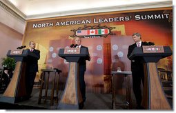 President George W. Bush delivers his remarks at a joint news conference Tuesday, April 22, 2008 in New Orleans, with Mexico's President Felipe Calderon and Canada's Prime Minster Stephen Harper. White House photo by Joyce N. Boghosian