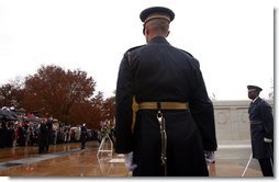 The President takes part in a wreath laying ceremony to commemorate Veterans Day at Arlington National Cemetery on Monday November 11, 2002  White House photo by Paul Morse