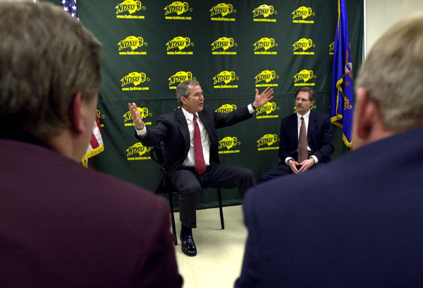 President George W. Bush meets with area farmers from North Dakota following his North Dakota Welcome at North Dakota State University in Fargo, Thursday, Mar 8. Also pictured at right is North Dakota Gov. John Hoeven.