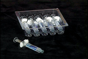 Manufacturer-supplied prefilled glass syringes.