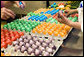 White House staff carefully inspect the hundreds of colorful Easter Eggs, Friday, April 14, 2006 in the White House kitchen, being prepared for Monday's annual White House Easter Egg Roll on the South Lawn of the White House. White House photo by Shealah Craighead