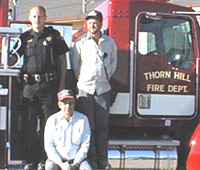 firefighters aboard new fire truck made possible through Clinch-Powell RC&D-assisted grants 