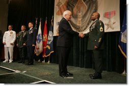 Vice President Dick Cheney awards U.S. Army Sgt. 1st Class Stephan Johns the Silver Star during the Heroism Awards Ceremony at the Davis Conference Center, MacDill Air Force Base, in Tampa, Fla., Friday, June 10, 2005.  White House photo by David Bohrer