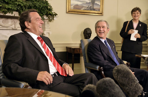 President George W. Bush and German Chancellor Gerhard Schroeder talk with the media in the Oval Office Monday, June 27, 2005. White House photo by Eric Draper