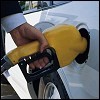 Photo of Person Filling Car at Gas Pump