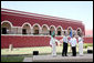 President George W. Bush and Mrs. Laura Bush are greeted onstage at Hacienda Temozon by President Felipe Calderon and Mrs. Margarita Zavala during arrival ceremonies Tuesday, March 13, 2007, in Temozon Sur, Mexico. White House photo by Paul Morse