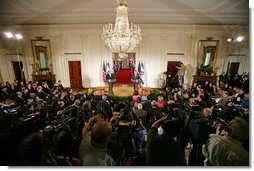 President George W. Bush and Prime Minister Ehud Olmert of Israel hold a joint press conference in the East Room Tuesday, May 23, 2006.  White House photo by Kimberlee Hewitt