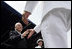 Vice President Dick Cheney greets each graduate as they receive their diplomas during the U.S. Naval Academy graduation in Annapolis, Maryland, Friday, May 27, 2005. During the ceremony the Vice President delivered the commencement address to the Class of 2006 and said, "As of today, you, the Custodians of Liberty, will begin writing your own chapter of excellence and achievement for the United States Armed Forces. As military officers you will bring relief to the helpless, hope to the oppressed. You will protect the United States of America in a time of war, and you'll help to build the peace that freedom brings."
