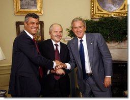 President George W. Bush shakes hands with Kosozo President Fatmir Sejdiu, center, and Kosovo Prime Minister Hashim Thaci, left, during a meeting Monday, July 21, 2008, in the Oval Office of the White House.  White House photo by Eric Draper
