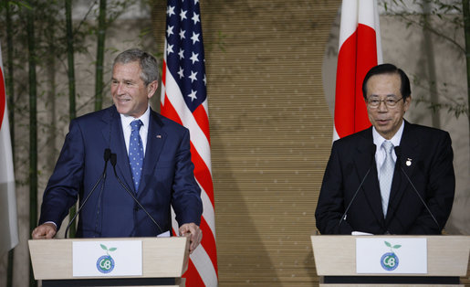 President George W. Bush and Japan's Prime Minister Yasuo Fukuda listen to questions from the audience during a joint press availability Sunday, July 6, 2008, at the Windsor Hotel Toya Resort and Spa. Japan is host to this year's 2008 Group of Eight Summit. White House photo by Eric Draper