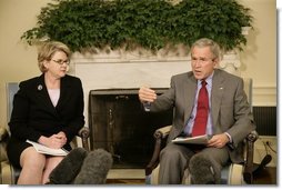 President George W. Bush and U.S. Secretary of Education Margaret Spellings meet with reporters, Wednesday, Oct. 19, 2005 in the Oval Office at the White House to discuss the Nation's Report Card.  White House photo by Eric Draper