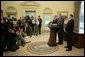 President George W. Bush is joined by Alan Greenspan, left, Chairman of the Federal Reserve, as he announces his nomination Monday, Oct. 24, 2005, of Ben Bernanke, right, as the new Chairman, to replace Mr. Greenspan when he retires in January. Said the President, "Ben Bernanke is the right man to build on the record Alan Greenspan has established. White House photo by Paul Morse