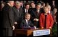 President George W. Bush signs H. R. 1, the Medicare Prescription Drug, Improvement and Modernization Act of 2003, at Constitution Hall in Washington, D.C., Dec. 8, 2003. "With this law, we are providing more access to comprehensive exams, disease screenings, and other preventative care, so that seniors across this land can live better and healthier lives," said President Bush. White House photo by Paul Morse