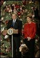 President George W. Bush and Laura Bush host a Christmas reception for children of deployed military personnel at the White House Monday, Dec. 8, 2003. A variety of activities were held for the children, including a performance of selected scenes from The Nutcracker and a visit by Santa Claus. White House photo by Eric Draper
