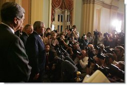 President George W. Bush, joined by Senate Minority leader Sen. Mitch McConnell and Sen. Trent Lott, foreground-left, addresses members of the media at the U.S. Capitol Tuesday, June 12, 2007, following his meeting with Senate Republican leaders and lunch with the Senate's Republican membership to ask their support for immigration reform legislation.  White House photo by Joyce N. Boghosian