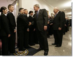 President George W. Bush and Vice President Dick Cheney shake hands with military personnel following their meeting with U.S military leaders at the Pentagon, Wednesday, Dec. 13, 2006. White House photo by Eric Draper