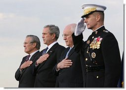 President George W. Bush, Vice President Dick Cheney and Joint Chiefs of Staff Chairman, General Peter Pace, stand with outgoing Secretary of Defense Donald Rumsfeld, left, during an Armed Forces Full Honor Review in the Secretary's honor at the Pentagon Friday, Dec. 15, 2006.  White House photo by Eric Draper