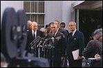 President Lyndon Johnson and General William Westmoreland speak to reporters in the "stake out" area outside the West Wing April 7, 1968.
