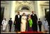 Arriving for the State Dinner President George W. Bush, Philippine President Gloria Macapagal-Arroyo, her husband Jose Miguel Arroyo and Laura Bush greet the press from the North Portico of the White House Monday, May 19, 2003. 