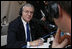 White House Chief of Staff Joshua Bolten talks with radio host John “JT” Thompson of WSBT Radio in South Bend, Ind., during the White House Radio Day Tuesday, Oct. 24, 2006.