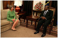 Laura Bush meets with President Benjamin Mkapa at the Presidential Residence in Dar Es Salaam, Tanzania, Wednesday, July 13, 2005. Mrs. Bush is visiting Africa to highlight U.S. aid and partnerships promoting programs for girls' education, HIV/AIDS awareness and women's empowerment. 