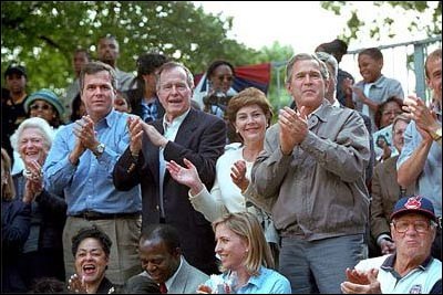 The Bush family enjoys a game of tee ball on the White House lawn on June 3, 2001. From left to right are Barbara Bush, Florida Governor Jeb Bush, former President George H.W. Bush, Laura Bush and President George W. Bush.