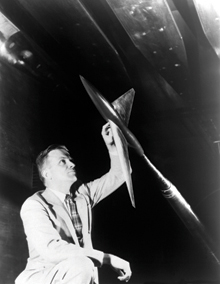 Robert T. Whitcomb showing area rule on a model.