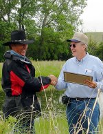 Rancher with Gene Mack.  Photo FWS.