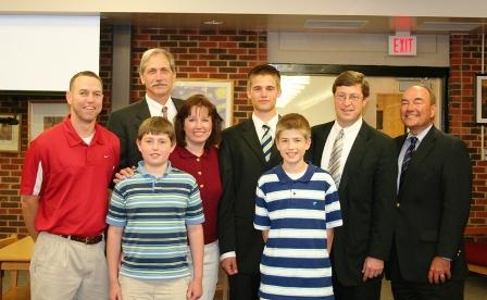 Congressman Chandler congratulates Nathan Liversedge on his appointment to the U.S. Naval Academy. Front: Jonathan and Matthew Liversedge; Back: Bart Flenor (WJHS Principal), Stephen and Lorrie Liversedge, Nathan, Chandler, Rod Brotherton (Academy Officer)