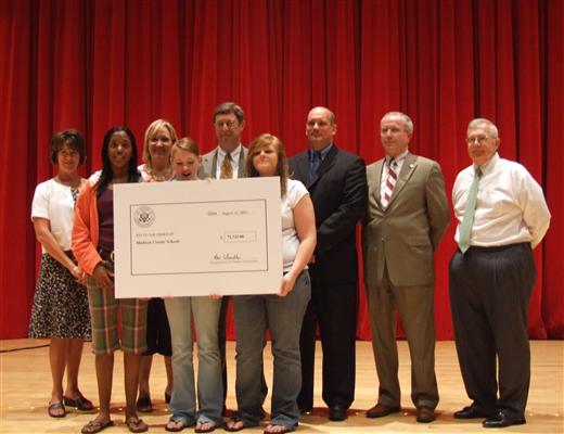 Congressman Chandler presenting a $71,000 check to the Madison County Literacy Initiative on August 14, 2008