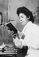 African American Woman Reading Book