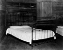 Part of the bedroom in the home of Floyd Burroughs, cotton sharecropper, Hale County, Alabama