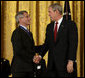 President George W. Bush shakes hands with Dr. Anthony Fauci Thursday, June 19, 2008, after presenting him with the 2008 Presidential Medal of Freedom during ceremonies in the East Room of the White House. White House photo by David Bohrer