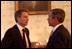 Before delivering his address to Congress and the nation following the attacks of September 11, President George W. Bush speaks with British Prime Minister Tony Blair in the Blue Room, Sept. 20, 2001. 