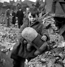 Young Boy Amid the Ruins of WW II London