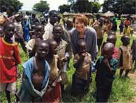 Susan visits with refugees in Uganda