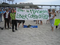 Susan advocates for lowering carbon emissions at an Earth Day gathering in Ocean Beach.