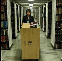 A Collections Management Divisions staff member in the original South Stacks of the Jefferson Building