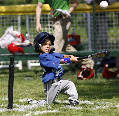 A player of the Jose M. Rodriguez Little League Angels from Manatí, Puerto Rico hits the ball during the 2008 Tee Ball on the South Lawn Season Opener Monday, June 30, 2008, on the South Lawn of the White House.