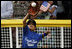 The first baseman of the Jose M. Rodriguez Little League Angels from Manatí, Puerto Rico reaches up to catch the ball during the season opener of the 2008 Tee Ball on the South Lawn Monday, June 30, 2008, on the South Lawn of the White House.