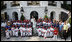  President George W. Bush and Mrs. Laura Bush stand with the All-Star Tee Ball teams and participants on the South Portico Wednesday, July 16, 2008, following a double-header at the White House, pitting Eastern U.S. against Central U.S. and Southern U.S. against Western U.S.