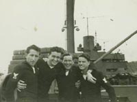Robert G. Fickle with buddies aboard USS Clarendon