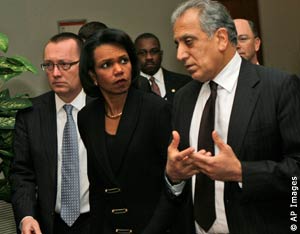 Rice and Khalilzad walking and talking (AP Images) 