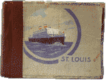 Photo album containing photographs taken by passengers aboard the St. Louis, with a depiction of the ship on the cover.