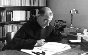 Father Jacques working in his office in Avon.