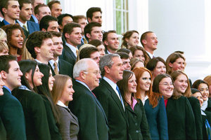 President George W. Bush and Vice President Dick Cheney pose with the Fall 2004 White House Interns on the North Portico steps of the White House, Nov. 15, 2004. White House photo by Eric Draper