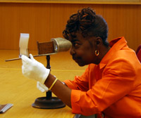 Staff member researching stereograph photos in the Prints & Photographs Reading Room