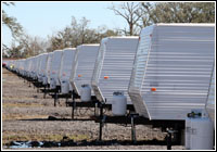 Rows of FEMA provided travel trailers are installed in Plaquemines Parish for the temporary housing of the community's displaced residents. Providing temporary housing in the disaster affected community enables the hurricane victims to be closer to home during the rebuilding process. Robert Kaufmann/FEMA