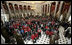 President George W. Bush and Speaker of the House of Representatives Nancy Pelosi stand amidst 300 Tuskegee Airmen during a photo opportunity Thursday, March 29, 2007, in Statuary Hall at the U.S. Capitol. White House photo by Joyce Boghosian