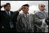 Veterans of World War II salute President George W. Bush Sunday, May 8, 2005, during a celebration at the Netherlands American Cemetery in Margraten, Netherlands, honoring those who served 60 years ago.